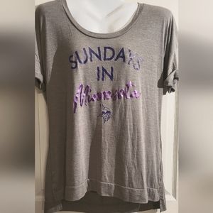 Ladies Vikings XL tee with detail open back and hemmed sleeves